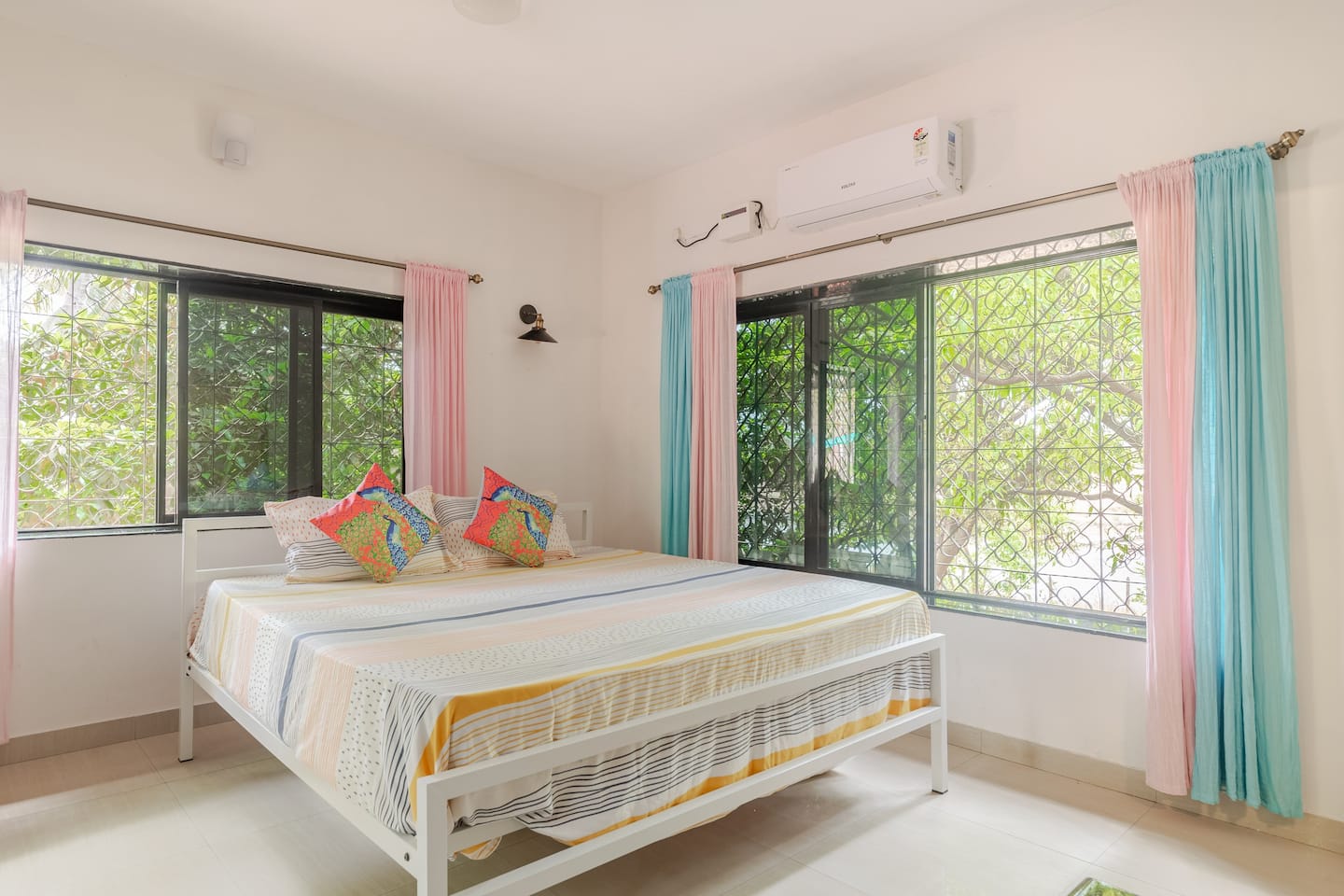 Bright, comfortable bedroom filled with natural light